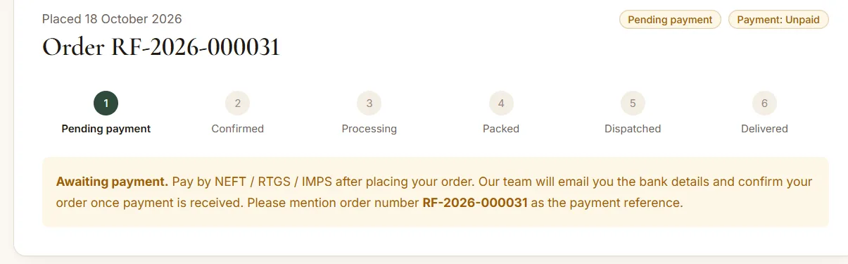 Order confirmation with six status steps from pending payment to delivered and bank transfer instructions